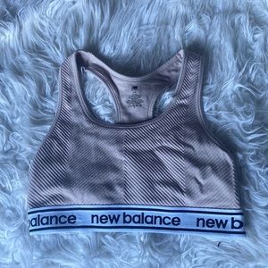 new balance light pink sports bra! size large!  worn never!